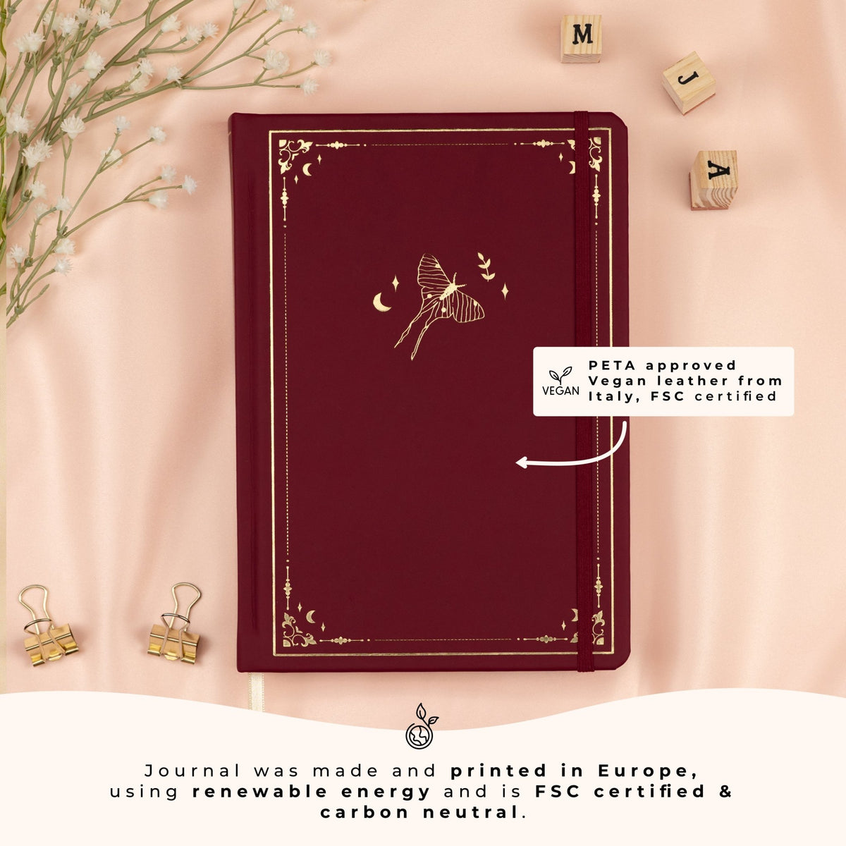 Red Forbidden Fruit A5 dotted premade bullet style journal made of PETA approved vegan leather, featuring FSC and carbon-neutral certifications, sustainably made in Europe.