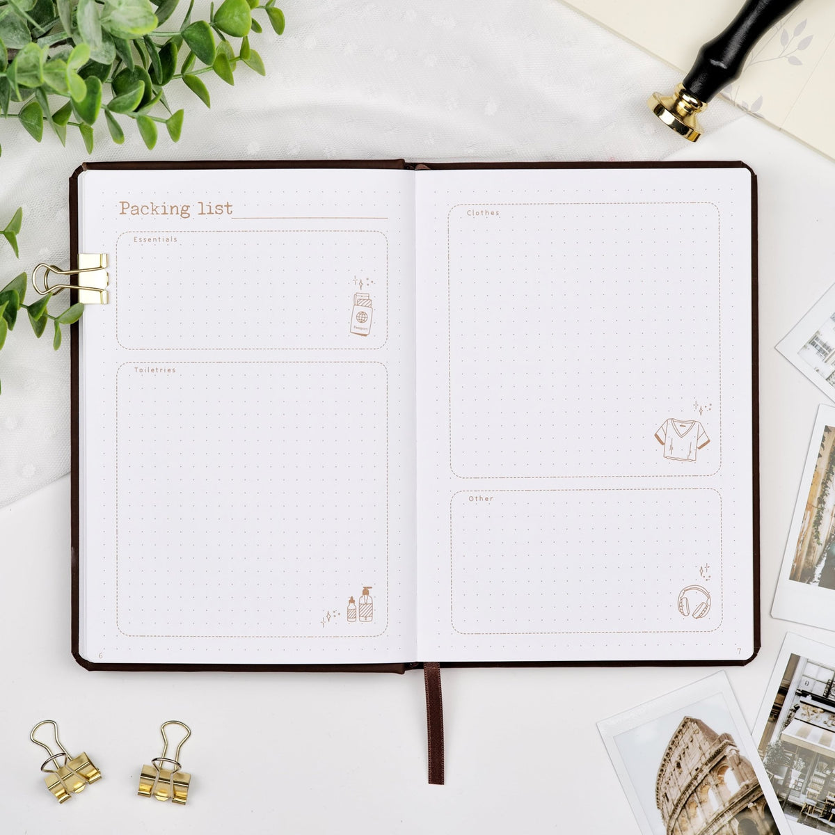 Premade travel notebook packing lists.