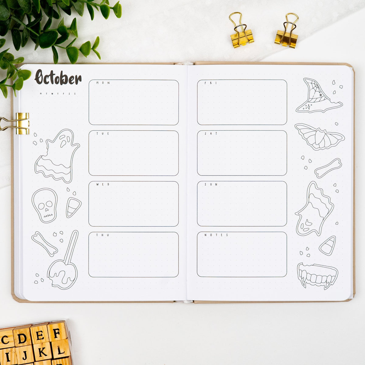 Second monthly weekly layout of a premade journal, with calligraphy October title, calendar, days and notes section.