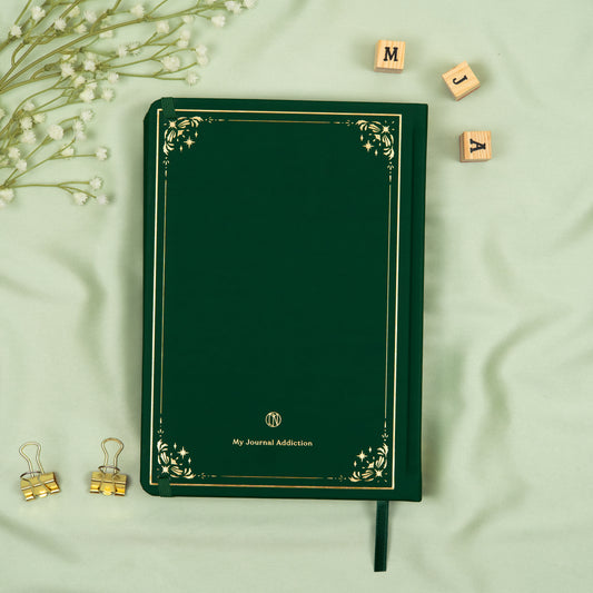 Vegan leather back cover of the dark green poison ivy premade bullet style journal with embossed gold logo detail.