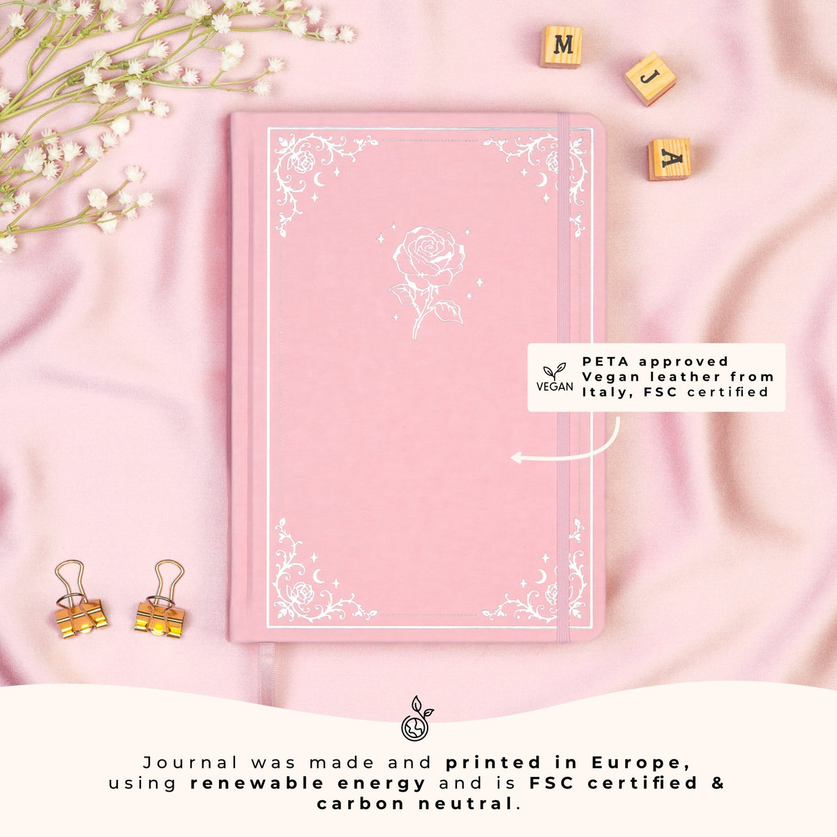 Pink A5 dotted premade bullet style journal made of PETA approved vegan leather, featuring FSC and carbon-neutral certifications, sustainably made in Europe.