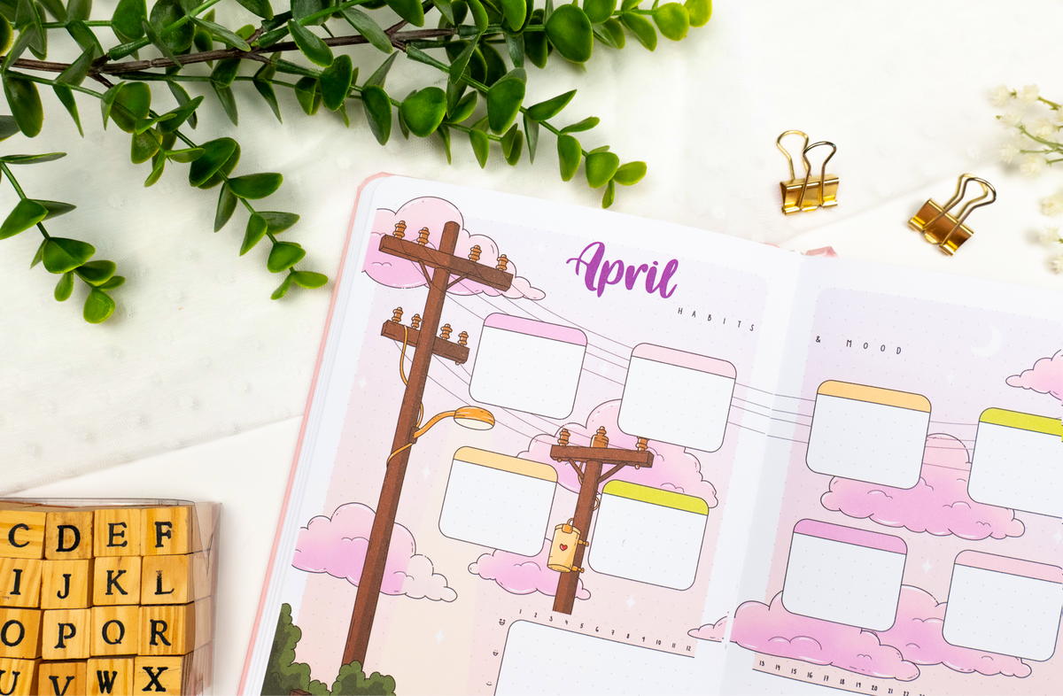 Premade bullet style journal opened on aesthetic april theme, coloring book style.