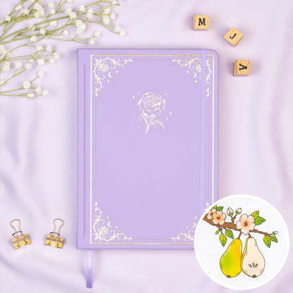 Lavender colored Premade bullet style journal made of Italian vegan leather with an embossed gold rose design.