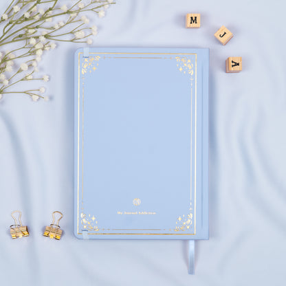 Vegan leather back cover of the Cloud premade bullet style journal with embossed gold logo detail.