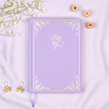 Lavender Premade bullet style journal made of Italian vegan leather with an embossed gold rose design.
