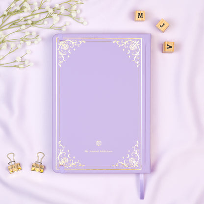 Vegan leather back cover of the Lavender premade bullet style journal with embossed gold logo detail. 