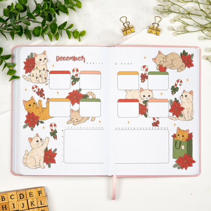 December precolored habits and mood tracker spread with illustrations of cats in christmas mood.