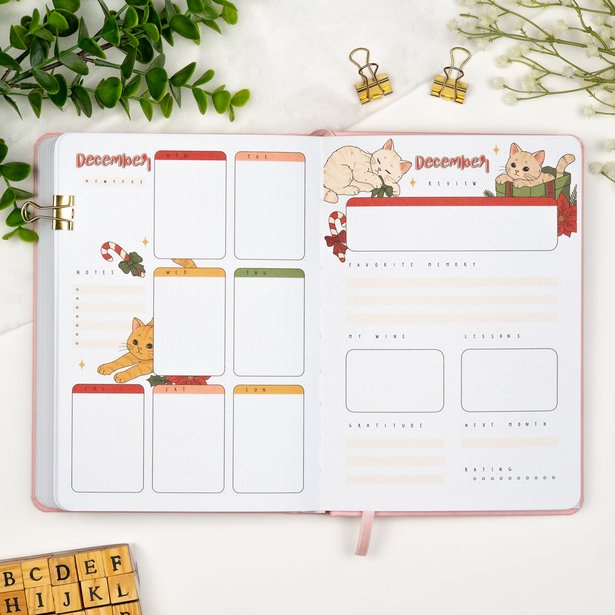 Fifth monthly weekly layout of a premade journal with calligraphy title, calendar, days and notes section and a monthly review page.